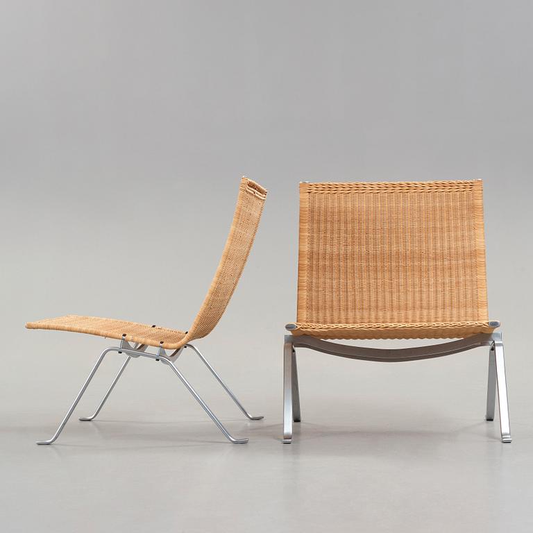 Poul Kjaerholm, a pair of 'PK-22' steel and rattan easy chairs by E Kold Christensen, Denmark.