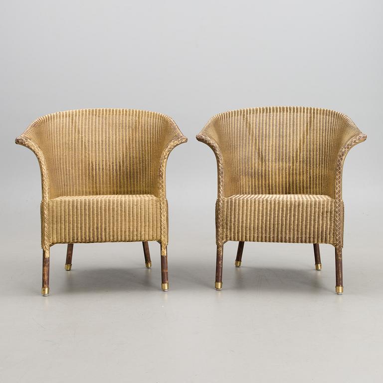 A PAIR OF ARM CHAIRS, Lloyd Loom, Spalding England, for Mulberry's Home, turn of the 21st century.