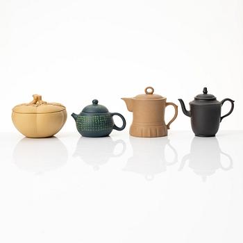 A group of three yixing teapots and a box with cover, China, 1970/80s.