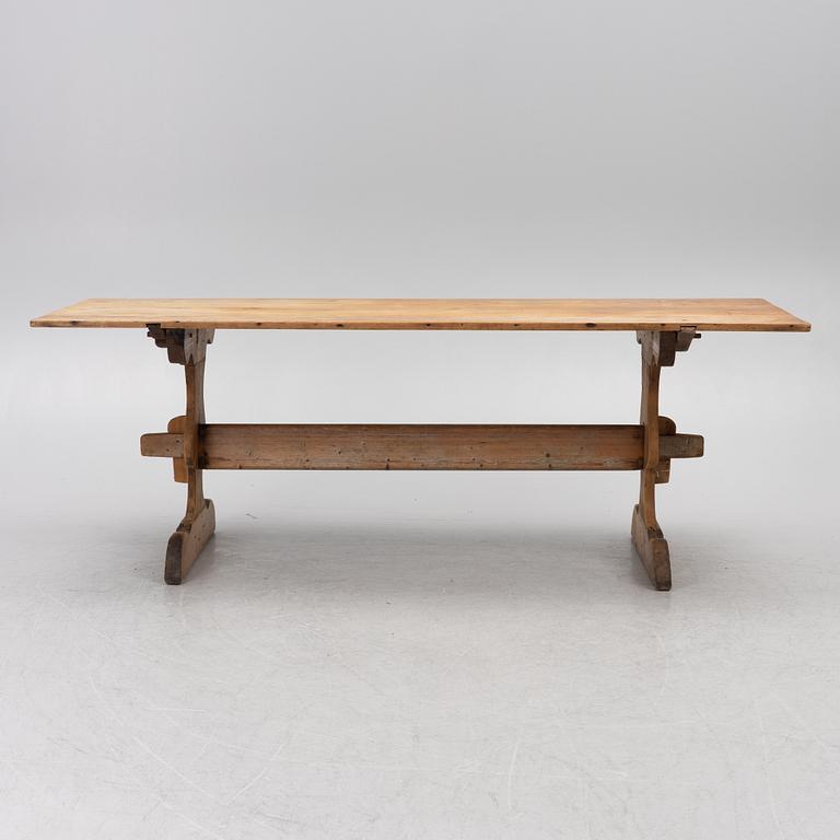 A Swedish pine trestle table, 18th / 19th century.
