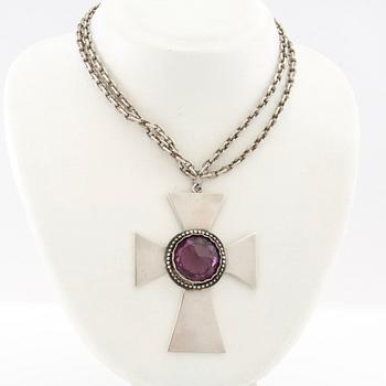 Necklace of silver in the form of a cross with faceted glass.