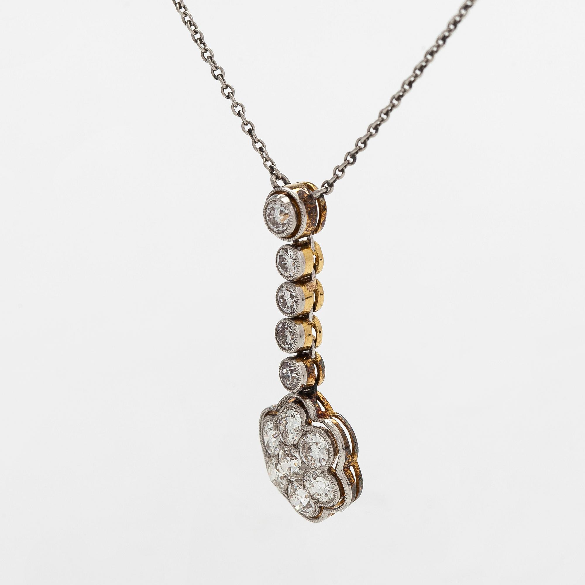 A platinum/17K gold necklace, set with old-cut diamonds, first half of the 20th century.