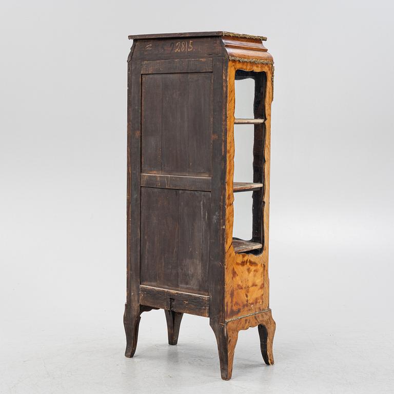 A 19th century, Rococo style display cabinet.