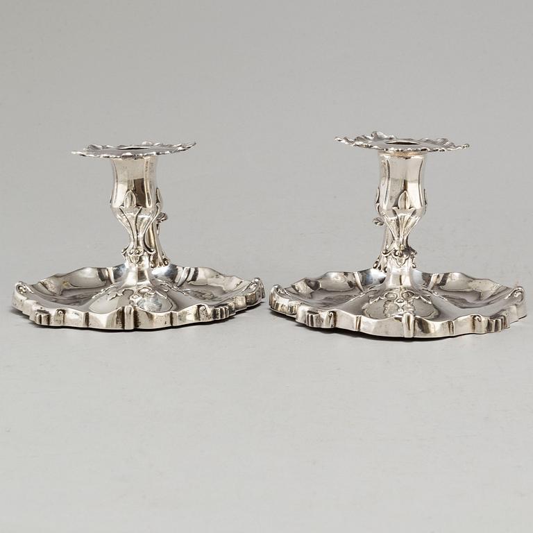 A pair of Swedish 19th century silver chamber candlesticks, mark of Christian Hammer, Stockholm 1867.
