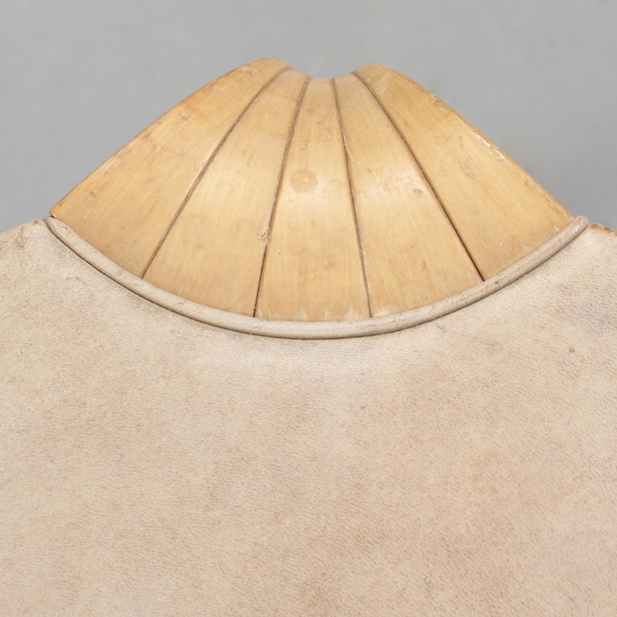 a "X600" stool by Alvar Aalto for Artek.