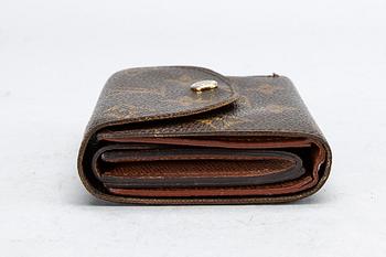 An 'Helene' wallet by Louis Vuitton.