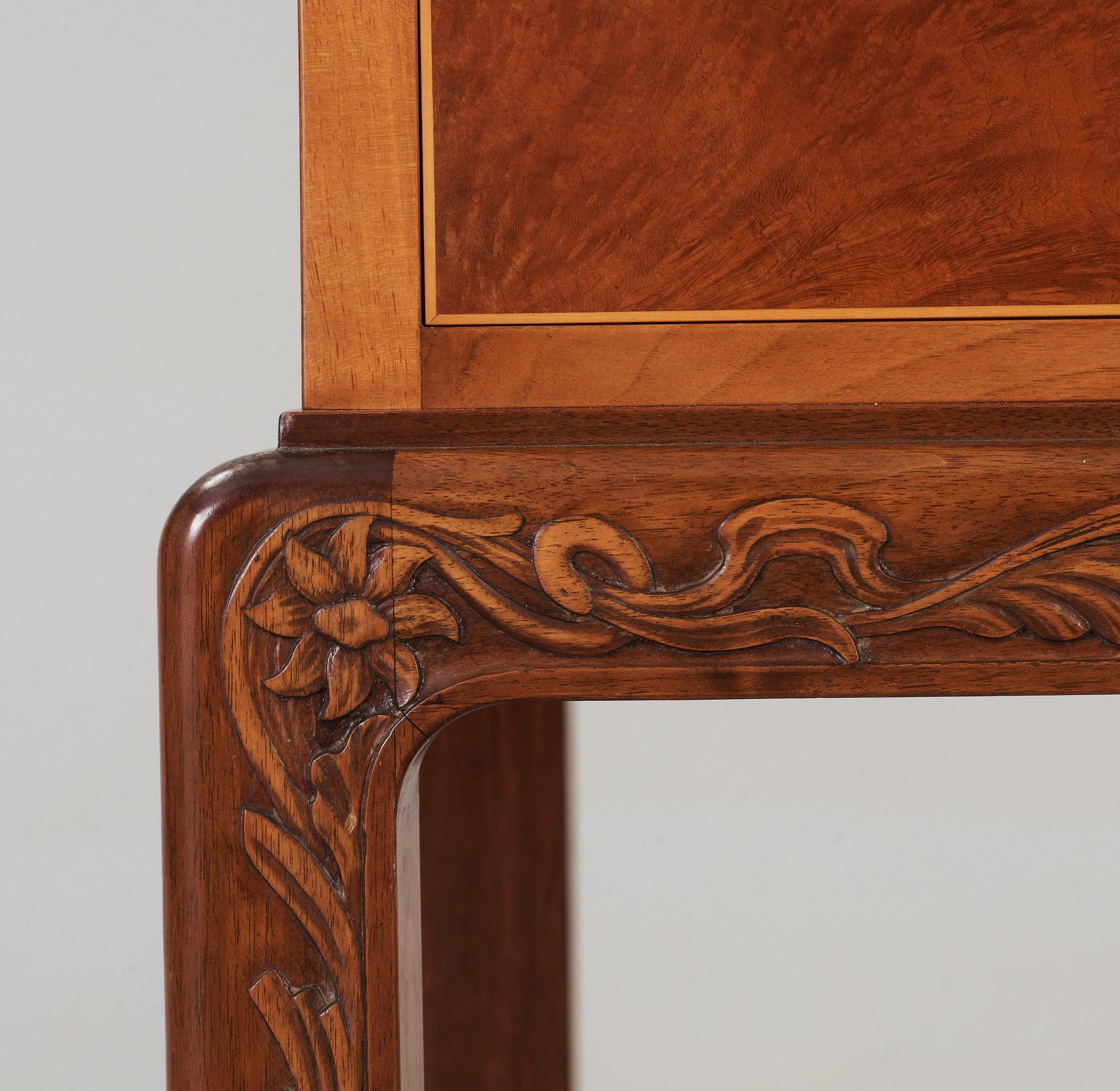 A Georg Johansson cabinet with inlays of several exotic woods, Gothenburg Sweden 1938.