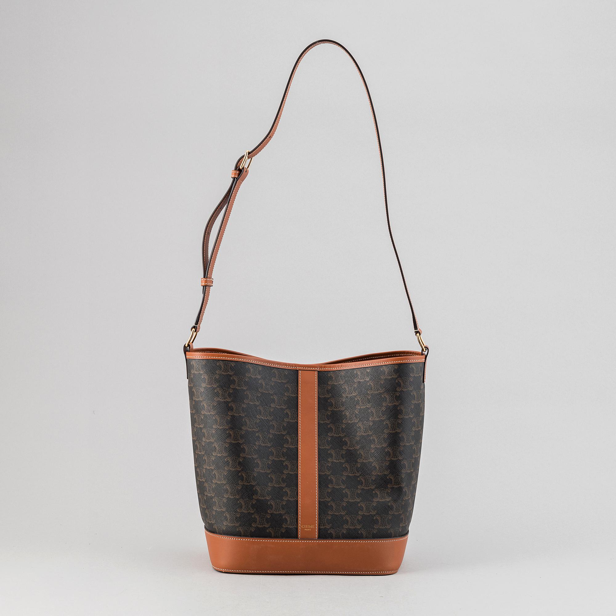 Céline, a canvas and leather handbag and wallet, 2020.