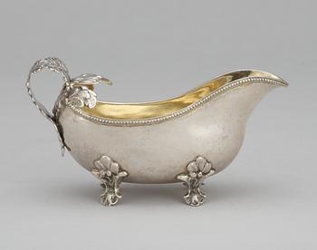 A Swedish 18th century parcel-gilt cream-jug, makers mark of Anders Schotte, Uddevalla 1797.