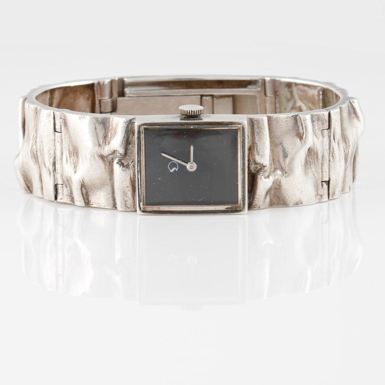 ARMBANDSUR, sterling silver, Matti Hyvärinen, Sirokoru, Åbo, 1975. Total vikt 55 g.