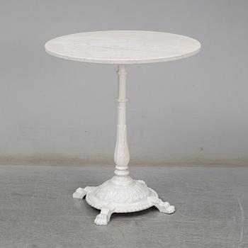 A cast iron and marble café table from Byarum.