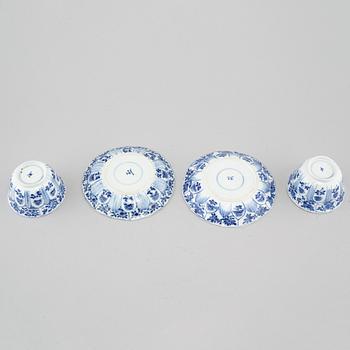 A pair of Kangxi  (1662-1722) Chinese porcelain cups with saucers.