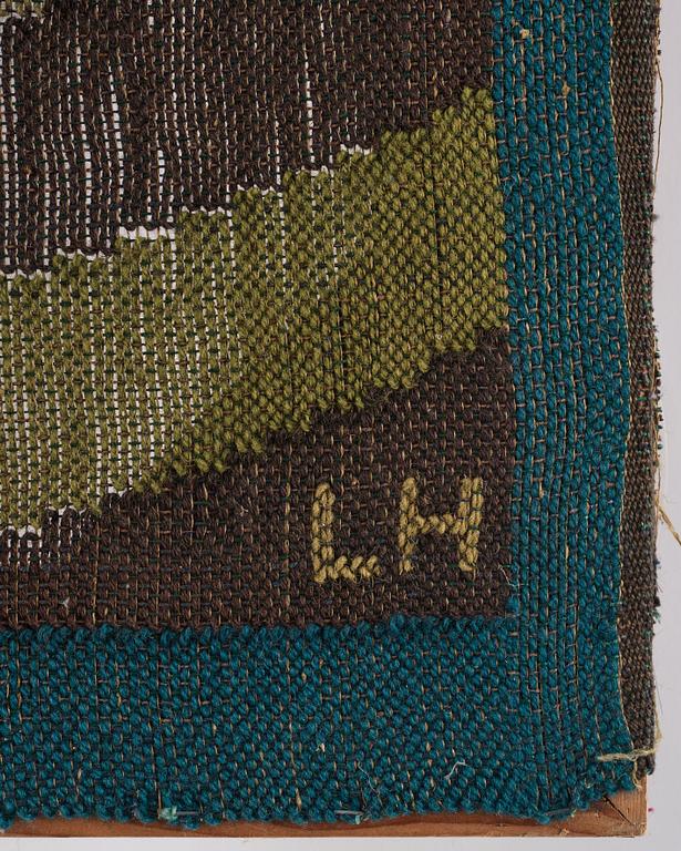 Lillian Holm, a tapestry, flat weave, ca 180,5 x 82 cm, signed LH. With the frame ca 182x79 cm.