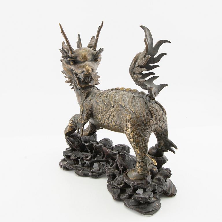 Dragon with stand, late Qing/early 20th century, bronze.