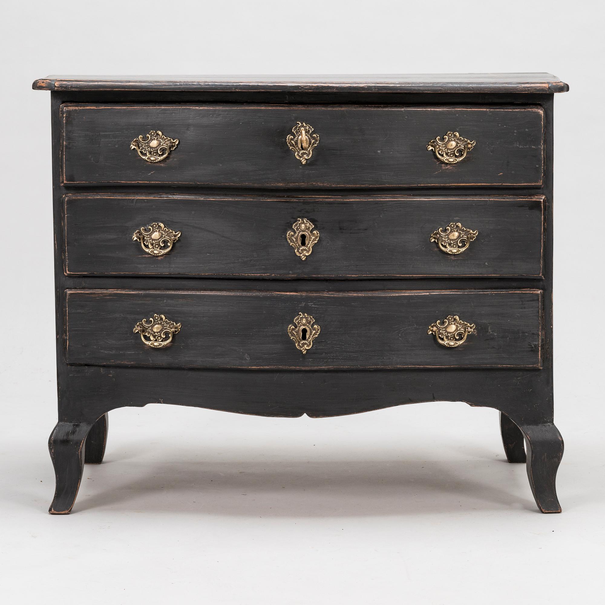 An 18th-Century chest of drawers.