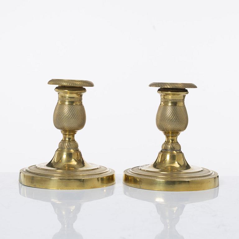 A pair of candle sticks, Empire, France, first half of the 19th century.