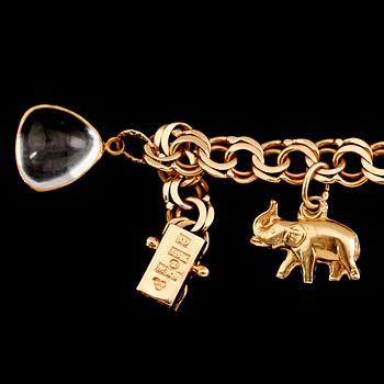 BERLOCKARMBAND, 18 k guld, 1959, bismarcklänk. Vikt ca 13 gram.