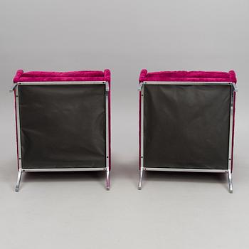 KIRSI VALANTI, a pair of 'Iso Onni' armchairs. 21st Century.