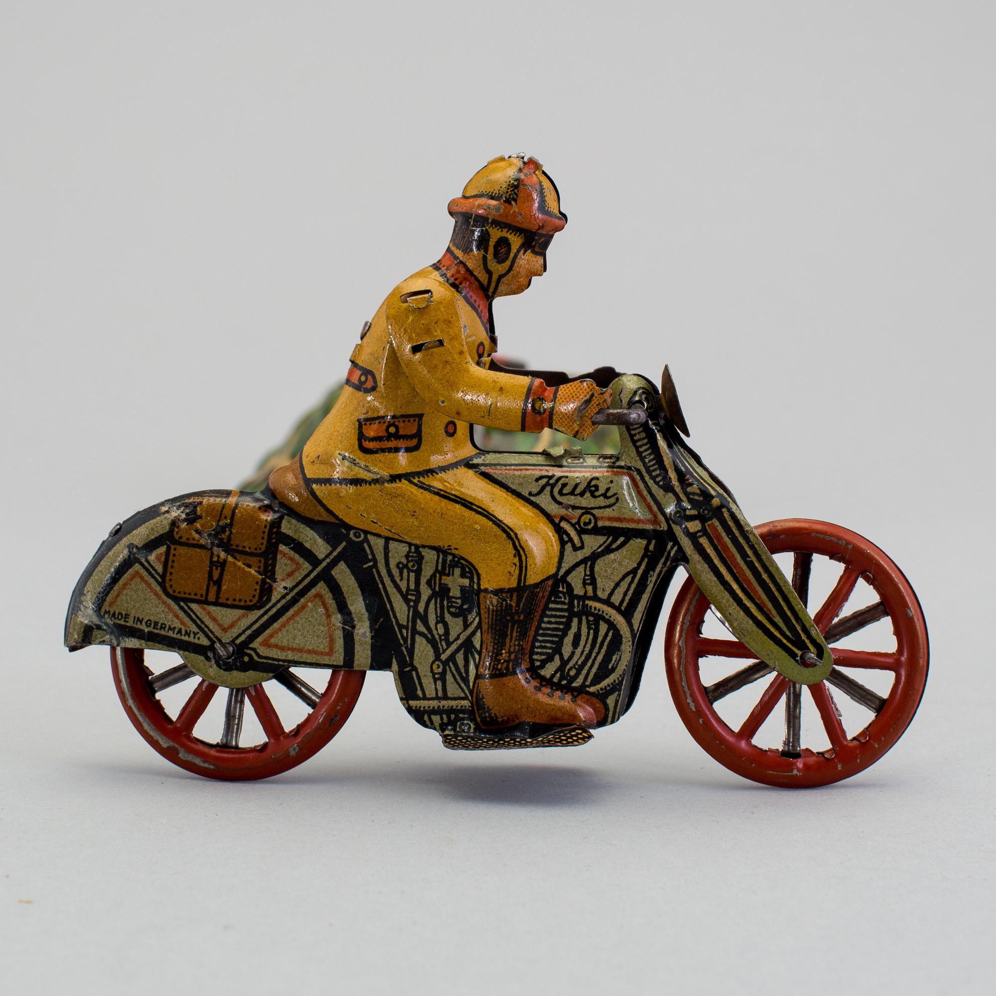 A tinplate Huki roundabout motorcycle, Germany, 1930s.