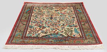 A silk Qum rug, central Persia, c. 210 x 138 cm.
