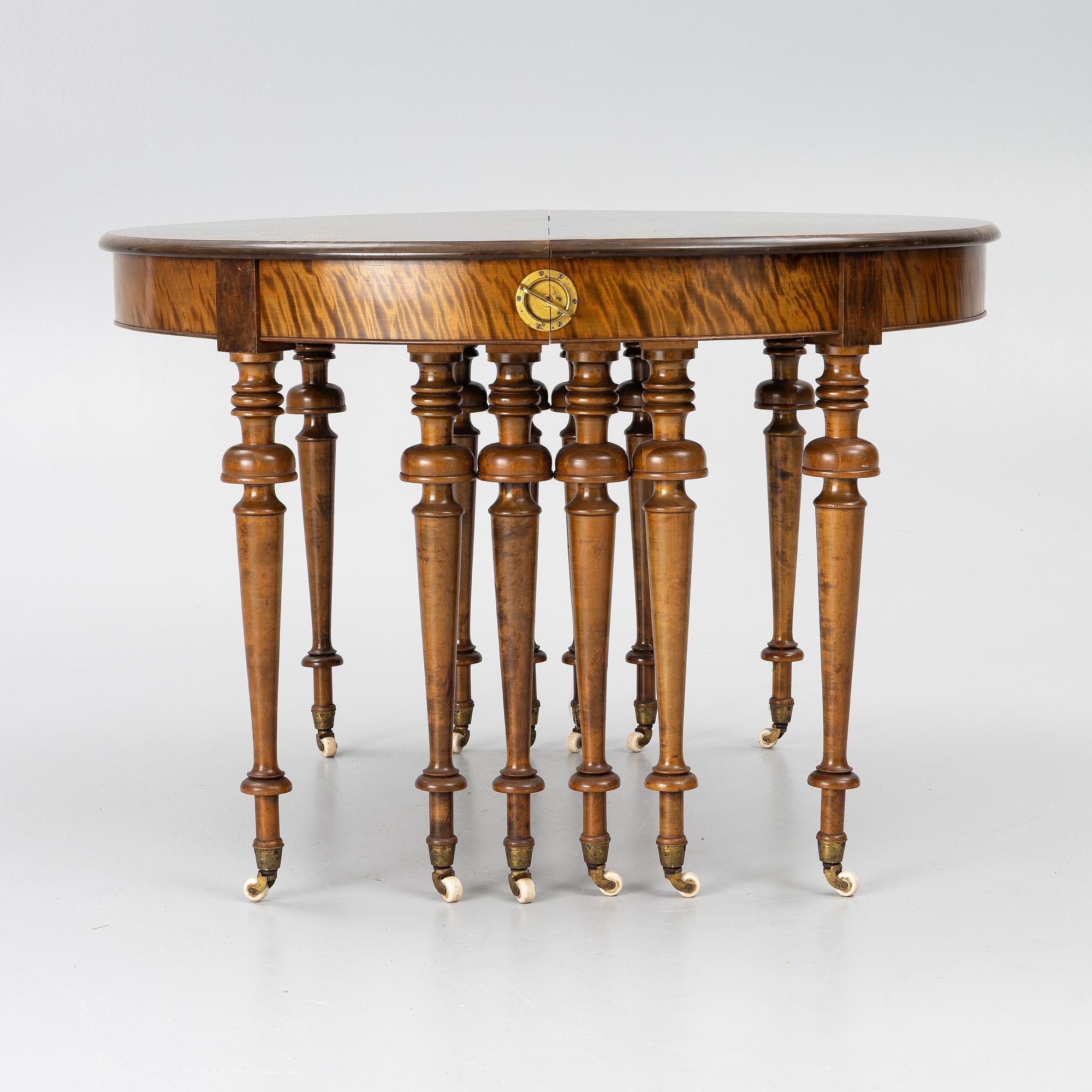 Dining table, circa 1900.