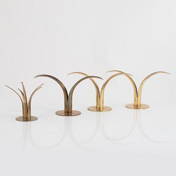 Ivar Ålenius-Björk, four brass candlesticks, Ystad Metall, mid 20th century.