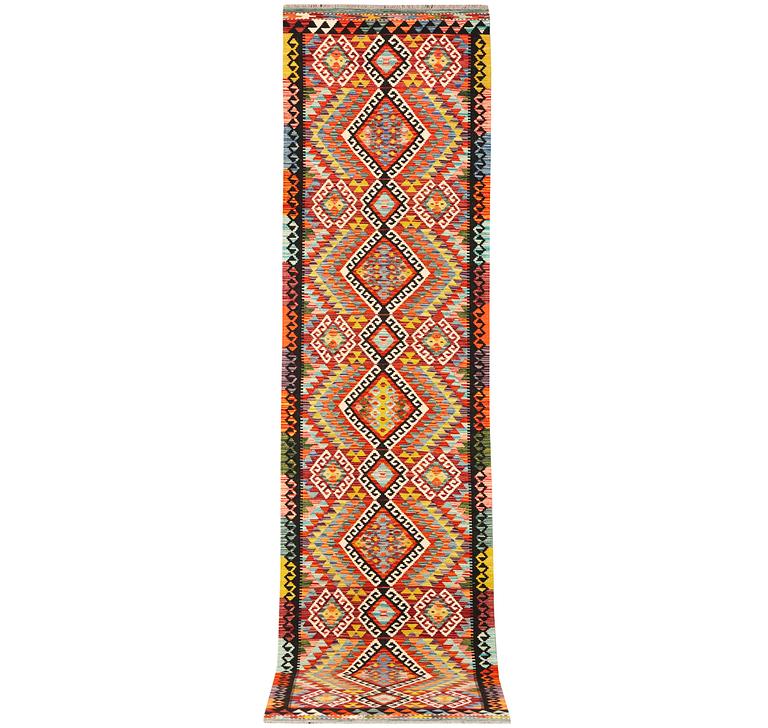 A Kilim runner carpet, c. 384 x 83 cm.