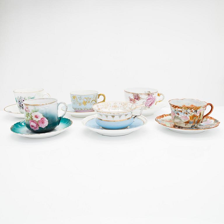 A set of 12 pair of porcelain mustache cups, including Germany, 19th and 20th century.