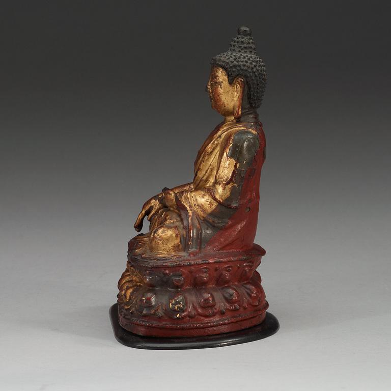 A partly gilt and lacquered figure of Buddha, Qing dynasty (1644-1912).