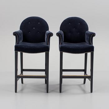 A pair of "The Simplified Moonback Counter Height Stool" barstools by Soane Britain.