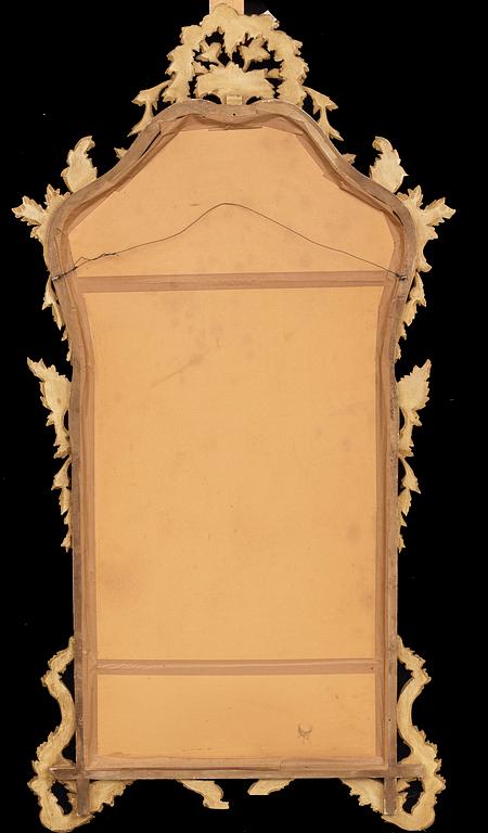 An mid 20th century Louis XV-style mirror from Paoletti, Firenze Italy.