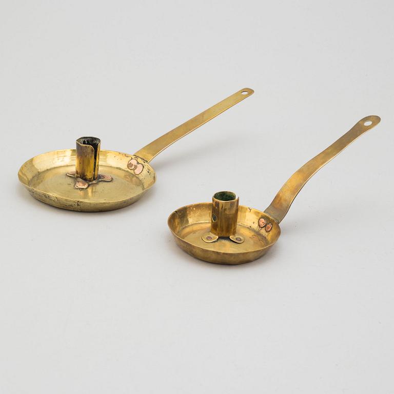 Two brass candlesticks, 18th century.