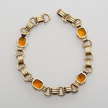 ARMBAND, 14 K guld med citriner, ca 9.00 ct. Vikt ca 16 g.