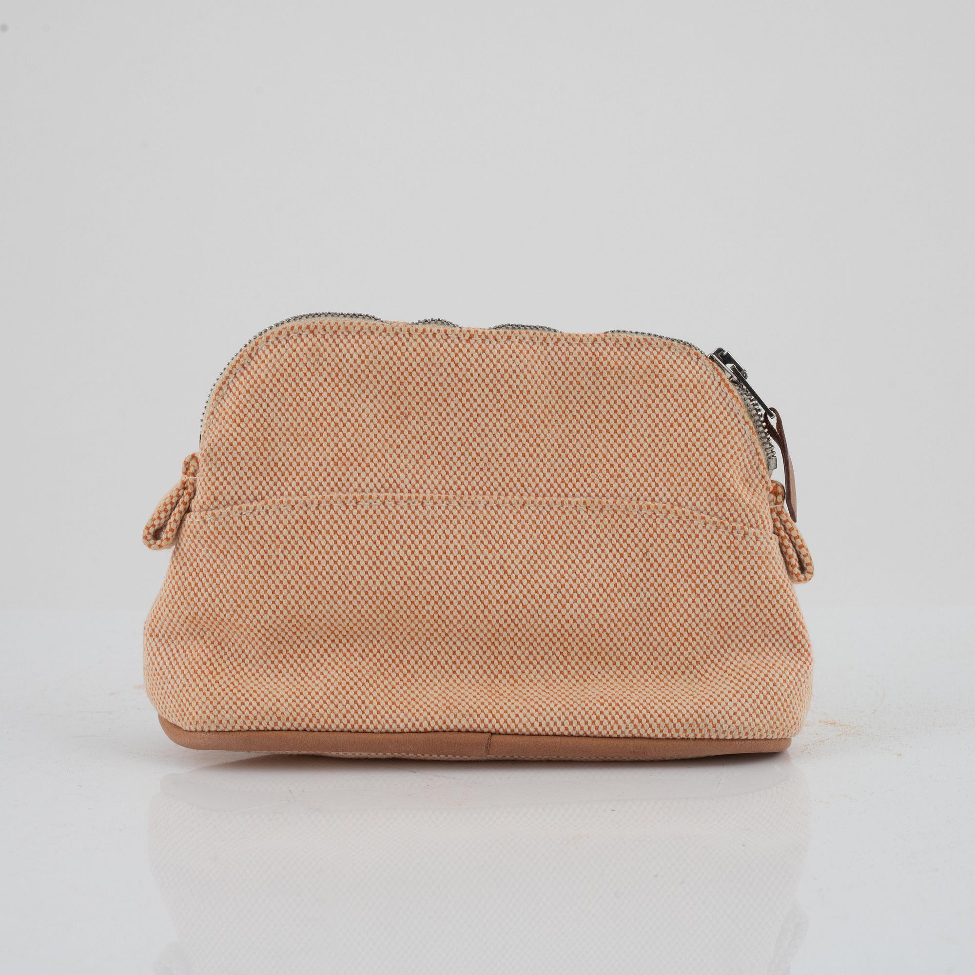 Hermès, "Fourre tout PM" bag and toiletry bag.
