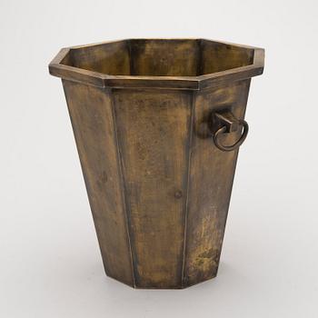 A patinated brass champagne bucket from the first half of the 20th Century.