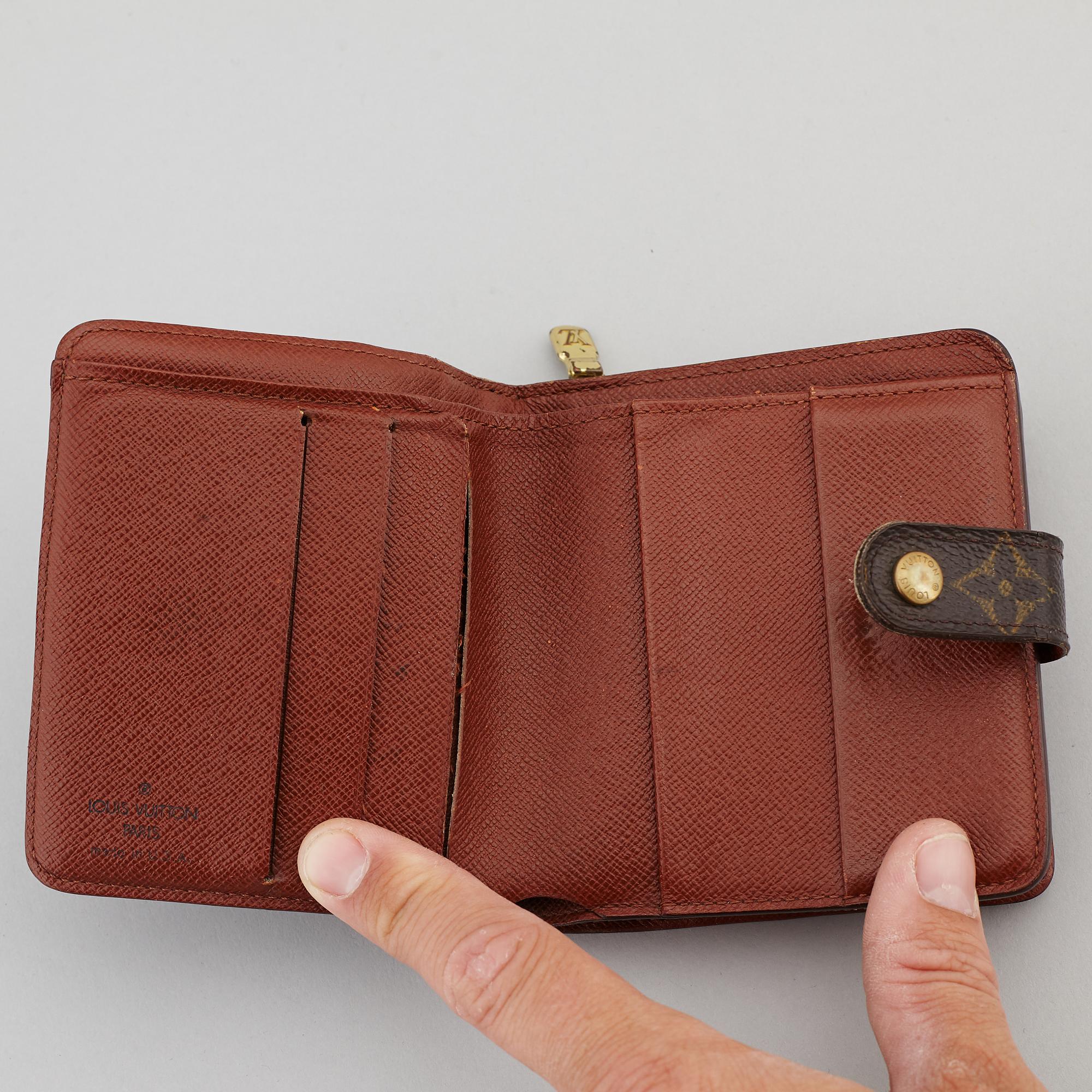 LOUIS VUITTON, a monogram canvas wallet.