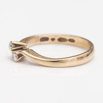 An 18K gold ring with diamonds ca. 0.12 ct in total. Finland 1974.