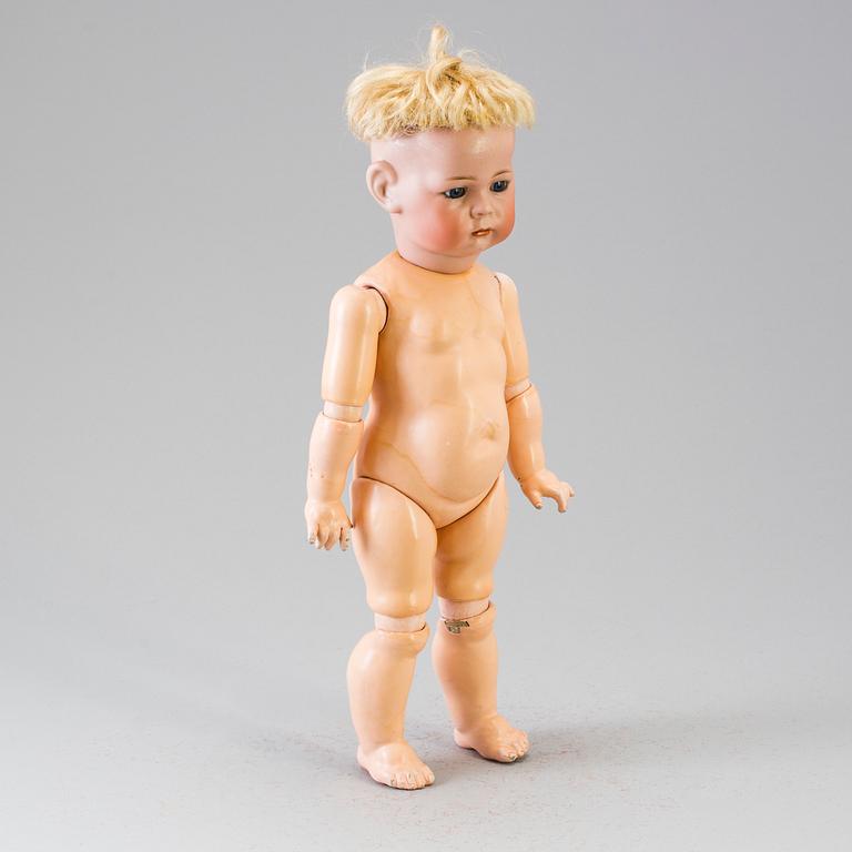 A bisque head character doll 115A by Kämmer & Reinhardt, Germany, ca 1911.