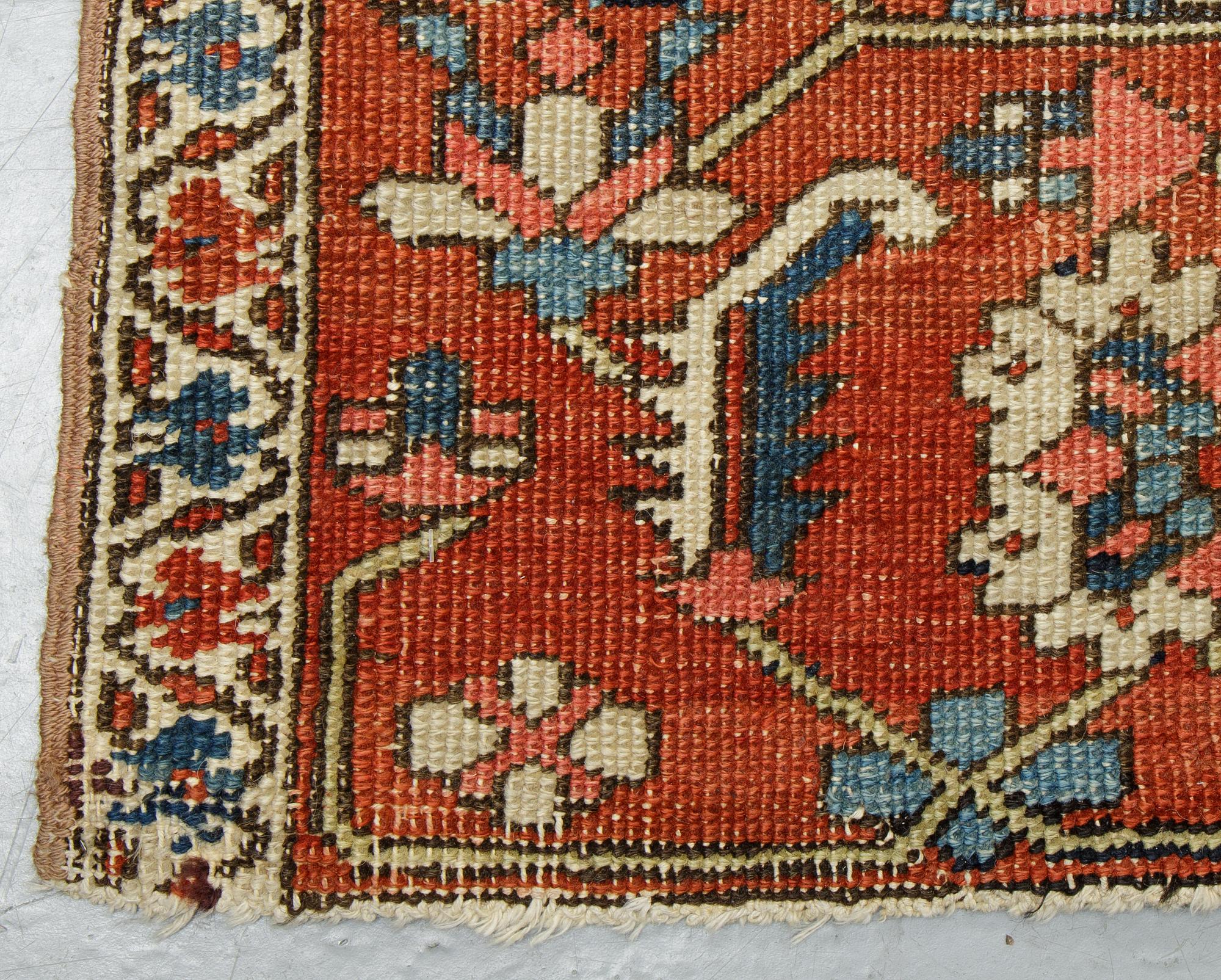 Matto, an antique Heriz, ca 364 x 277 cm.