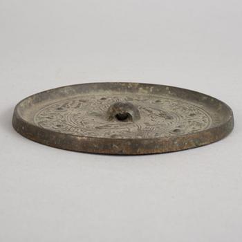 SPEGEL, brons. Handynastin (206 f. Kr. -220 e. Kr.).