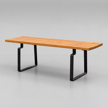 A pine and iron coffee table, mid 20th Century.