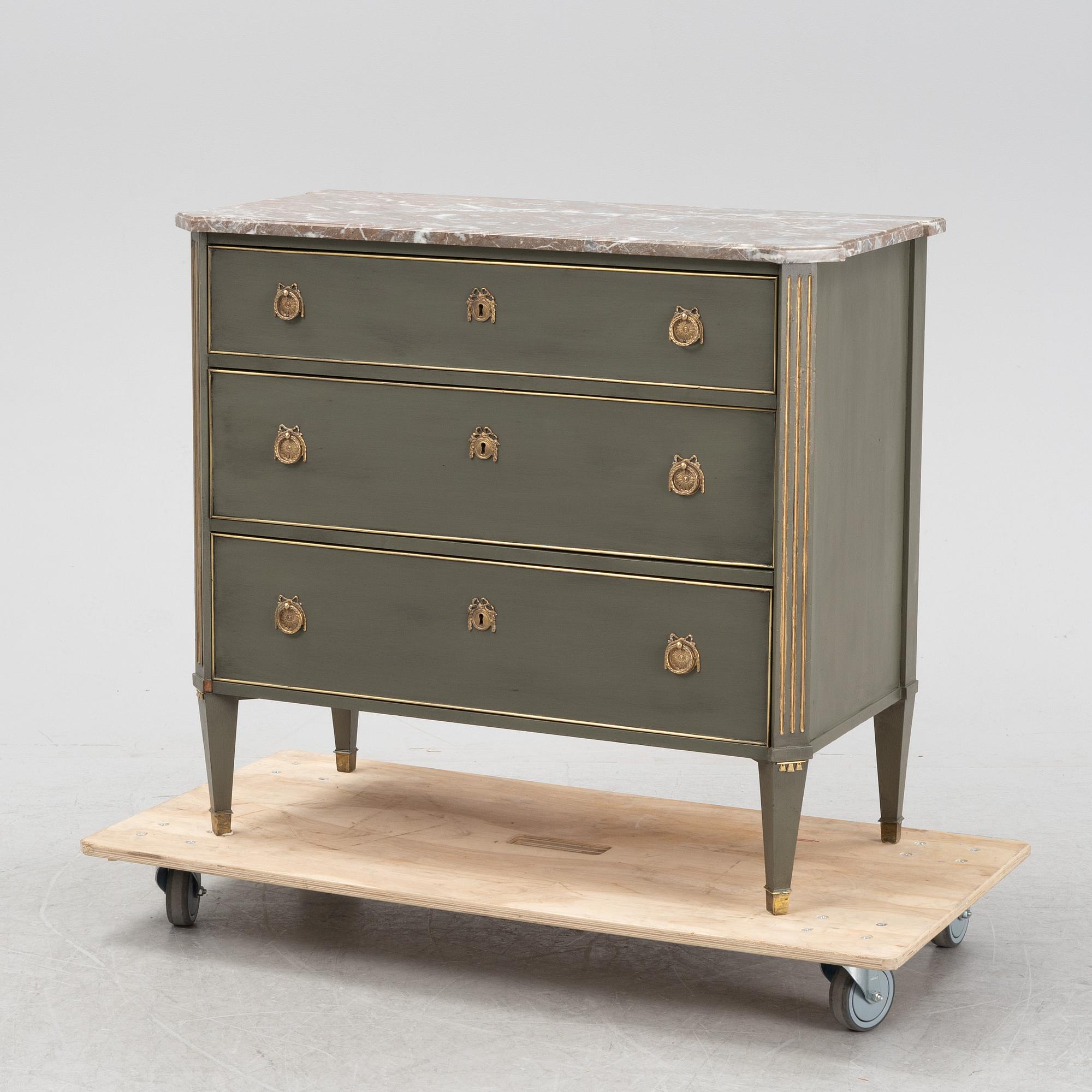 A late gustavian style chest of drawers, first half of the 20th Century.