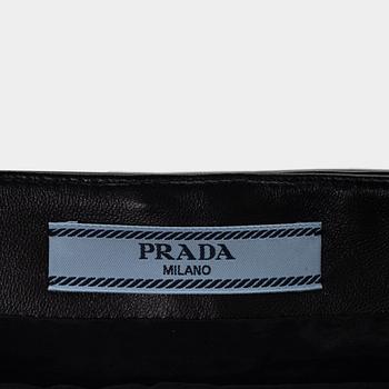 Prada, A suede and patent leather skirt, size 36.