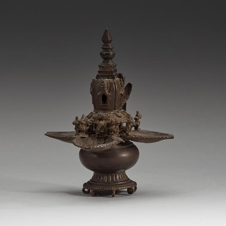 A copper alloy Tibetan/Nepalese Butter Lamp 'Sukunda', 19th Century.