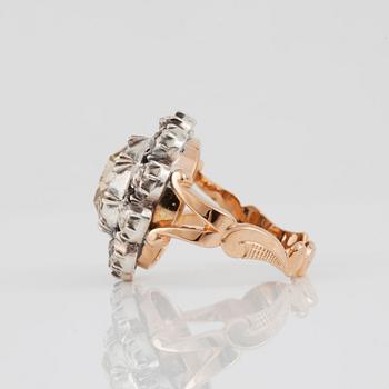 A brown and white rose-cut diamond ring.
