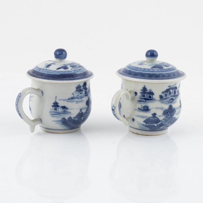 A blue and white terrine with cover and stand, Qianlong (1736-95) and two blue and white custard cups, 19th century.