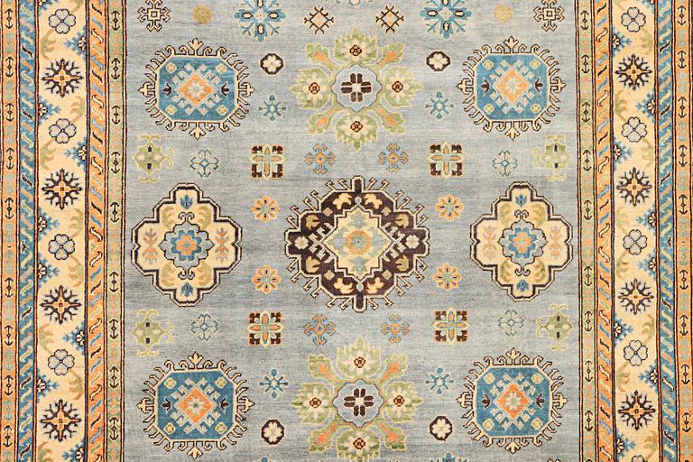 A Kazak carpet, c. 295 x 206 cm.