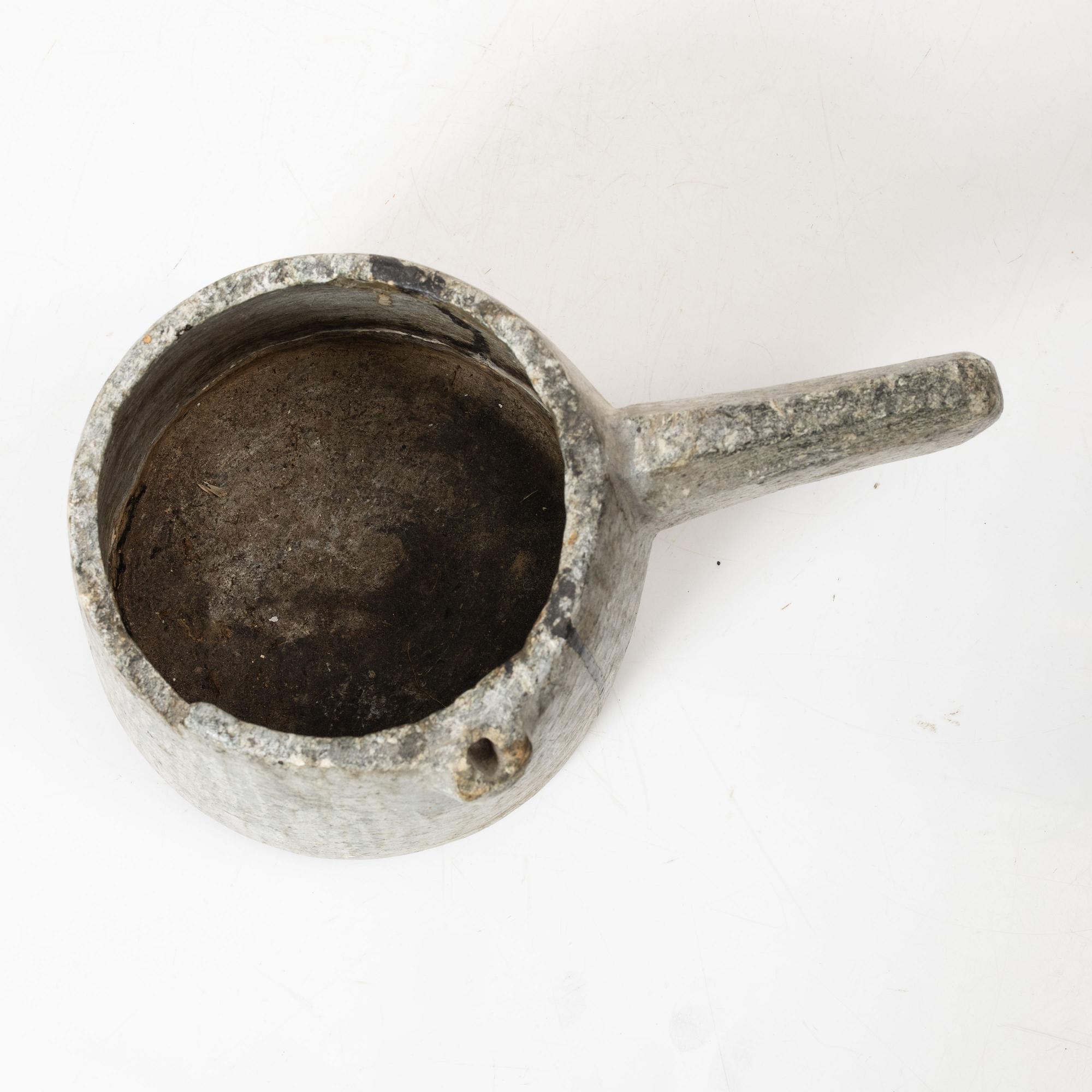 A Swedish carved soapstone jug, 19th century.