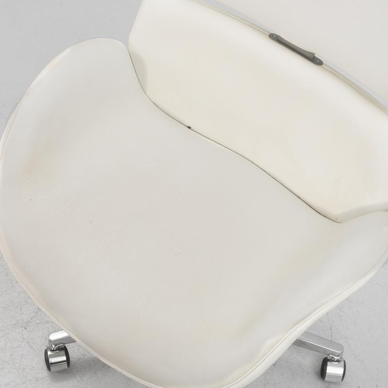 A contemporary swivel chair, Roche Bobois.