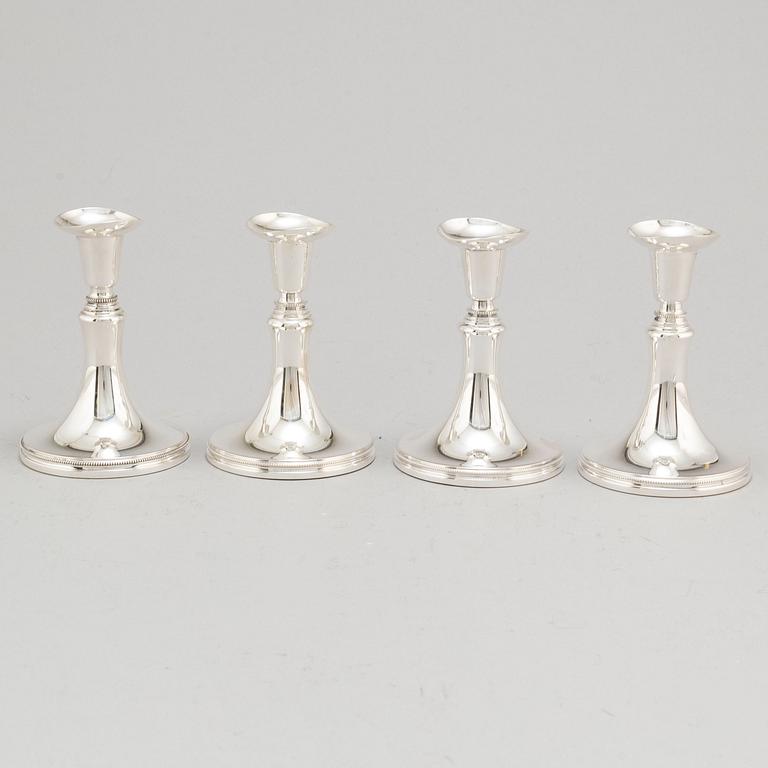 A set of four Swedish silver candlesticks, maker's mark Erik Löfman, Uppsala 1971-1973.